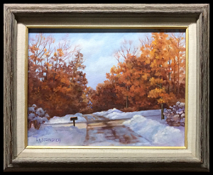 Early Snow is an original oil painting by L.K. Steinbach. This landscape depicts a snowy road framed on both sides with trees still displaying their rust-colored reddish brown autumn leaves.