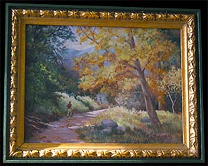 A Day in Ramsey Canyon is a landscape oil painting by Louise Steinbach which features a young man walking down a wooded path.