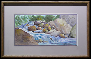Rocky Stream Colorado is an original watercolor painting by Louise Steinbach. This landscape depicts a rocky blue stream with small waterfalls surrounded by tan boulders.